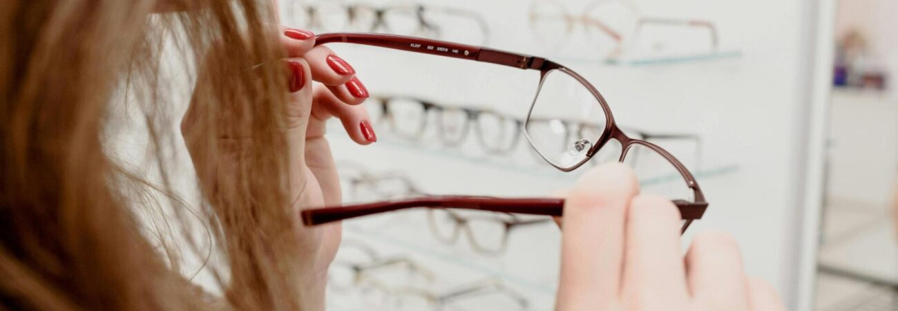 Woman choosing prescription eyeglasses